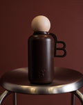 Paris luxury water bottle - dark brown stainless steel with rounded cap and handle